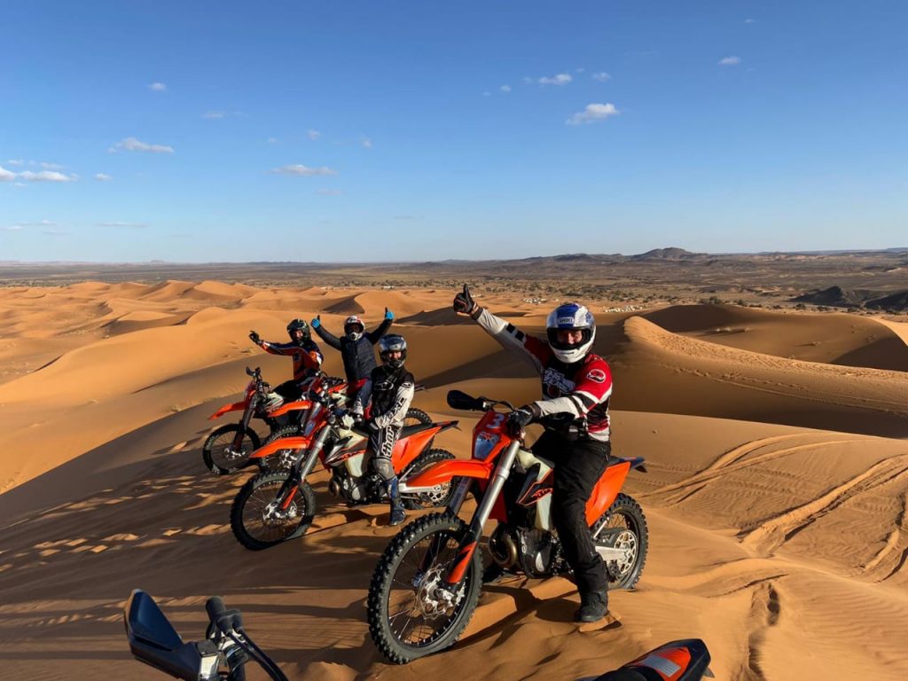 Riding Through The Dunes On A Motorbike